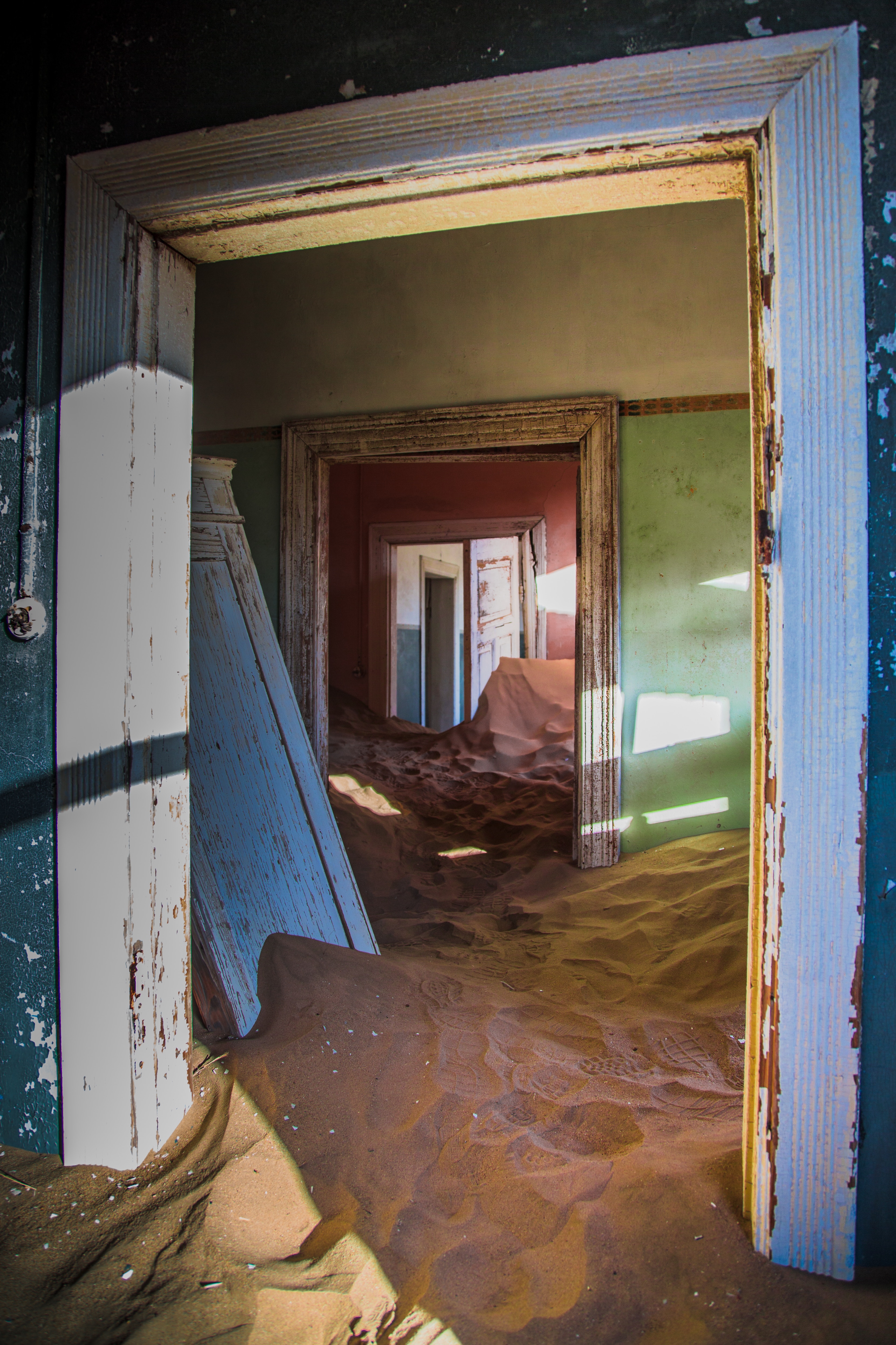 "a house invaded by sand"